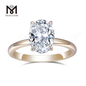 Anillo de compromiso con solitario de forma ovalada de oro rosado de 14 k con alianza